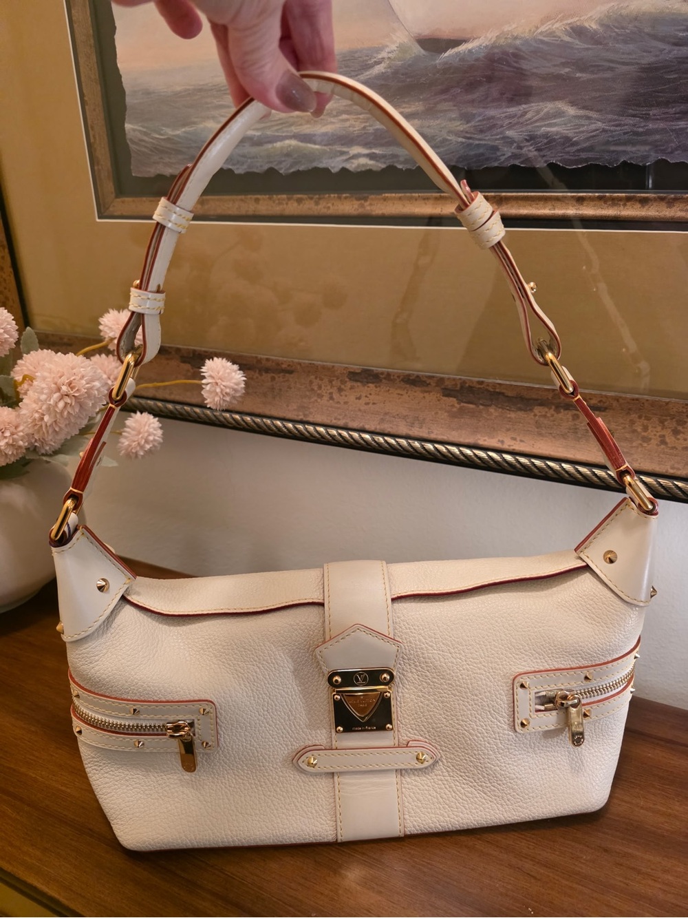 Louis Vuitton Suhali L’Impetueux
Cream Leather Shoulder Bag with Gold
